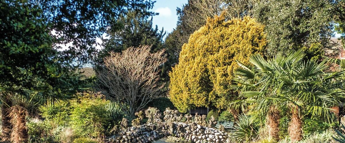 The River Lavant running through the beautifully landscaped West Dean Gardens near Chichester, England UK.
Reasonable admission prices and kids free entry (check first though as kids are charged on "event" days.