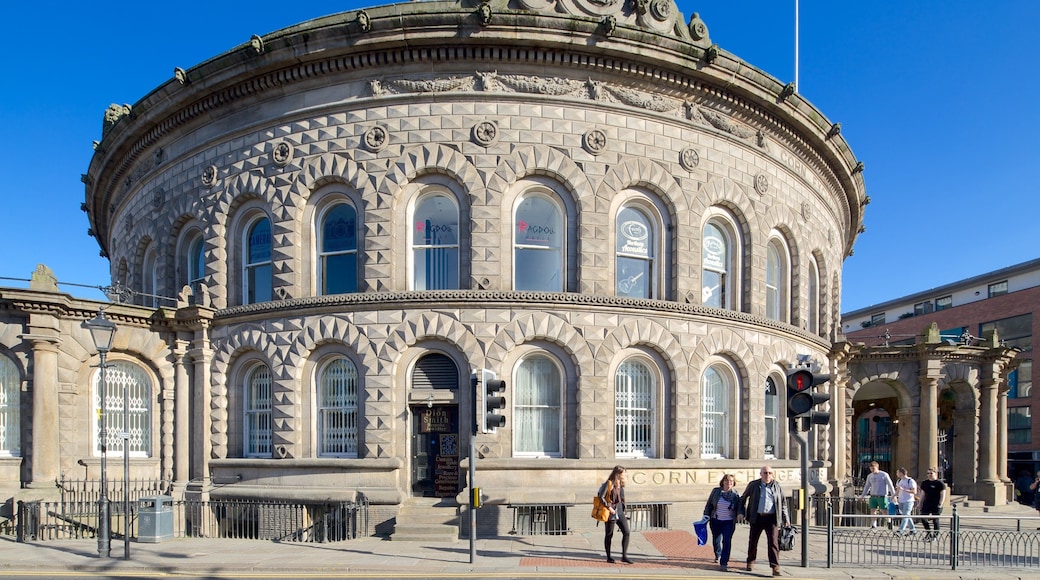 Corn Exchange which includes heritage architecture and street scenes as well as a small group of people