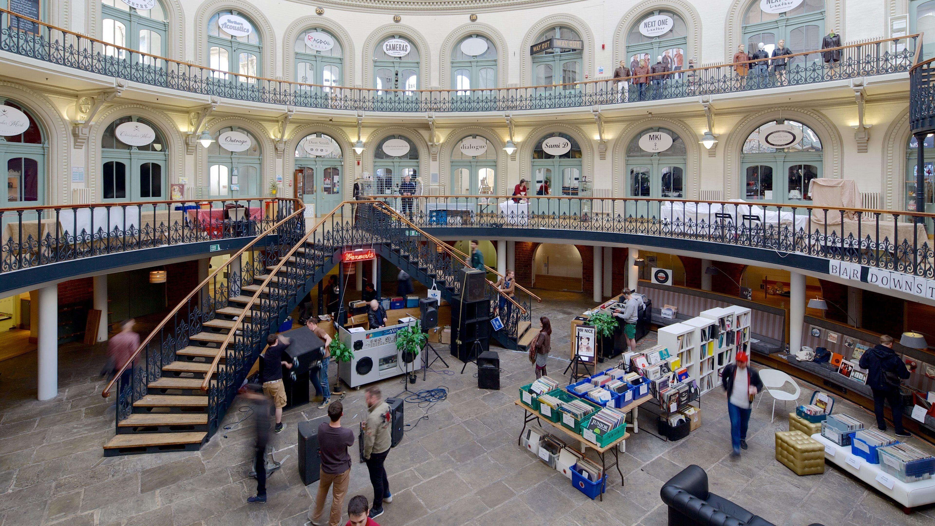 Corn Exchange showing interior views and heritage architecture as well as a small group of people