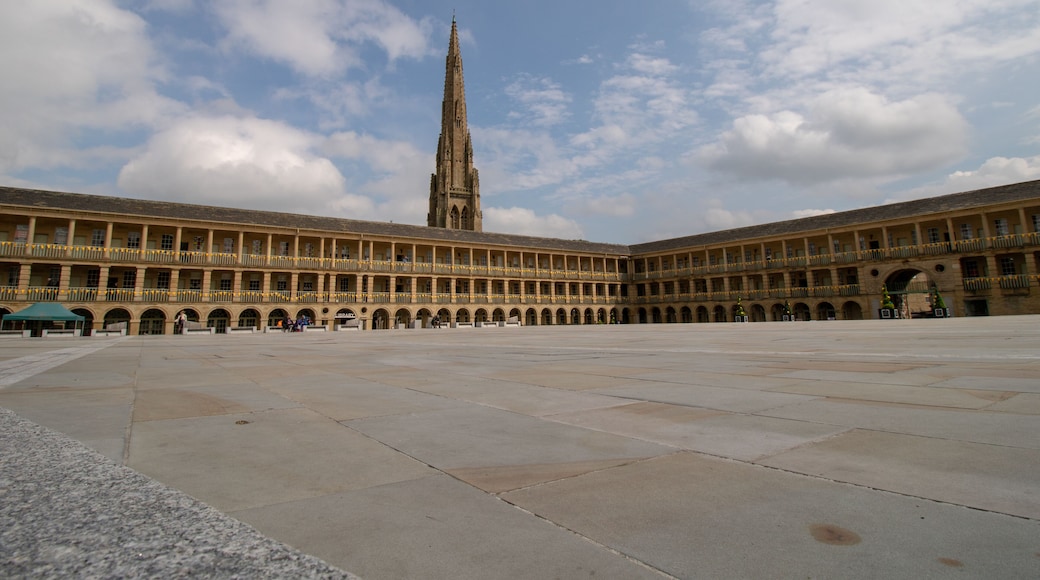 Halifax West Yorkshire UK, 10th May 2019: Photo of the famous Piece Hall in the Blackledge area of Halifax, showing the historic stone build building, taken on a part cloudy sunny day.