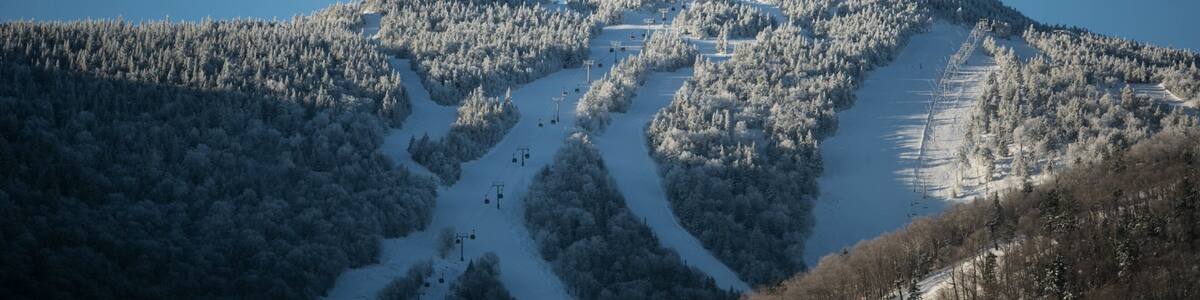 Killington Ski Resort showing snow, mountains and forest scenes