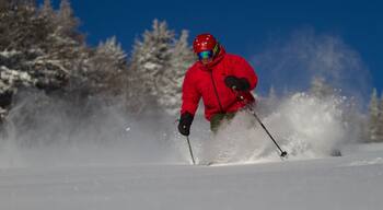 Killington Ski Resort which includes snow skiing and snow as well as an individual male