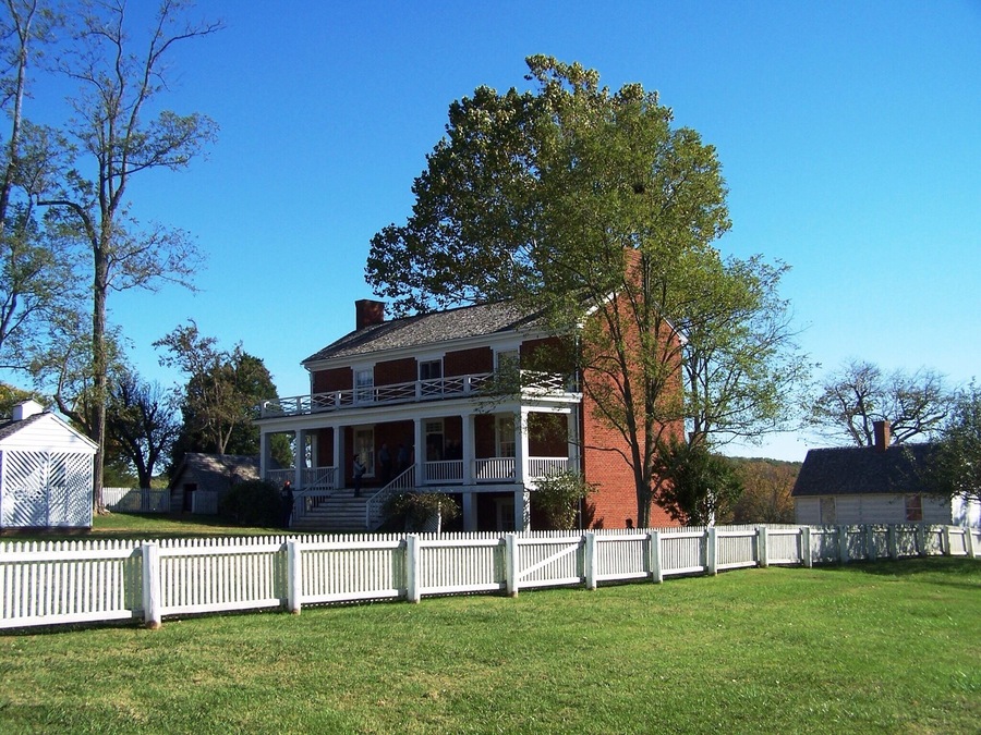 The initial engagement on July 21, 1861 of what would become the First Battle of Bull Run (First Manassas) took place on McLean's farm in Manassas, Virginia. Union Army artillery fired at McLean's house, which was being used as a headquarters for Confederate Brigadier General P. G. T. Beauregard, and a cannonball dropped through the kitchen fireplace.
McLean was a retired major in the Virginia militia, but at 47, he was too old to return to active duty at the outbreak of the Civil War. In the spring of 1863, he and his family moved about 120 miles south to Appomattox County, Virginia, near a dusty, crossroads community called Appomattox Court House.
On April 9, 1865, the war revisited McLean. Confederate General Robert E. Lee was about to surrender to Lieutenant General Ulysses S. Grant. He sent a messenger to Appomattox Court House to find a place to meet. On April 8, 1865, the messenger knocked on McLean's door and requested the use of his home, to which McLean reluctantly agreed. Lee surrendered to Grant in the parlor of McLean's house, effectively ending the Civil War. Later, McLean is supposed to have said "The war began in my front yard and ended in my front parlor."