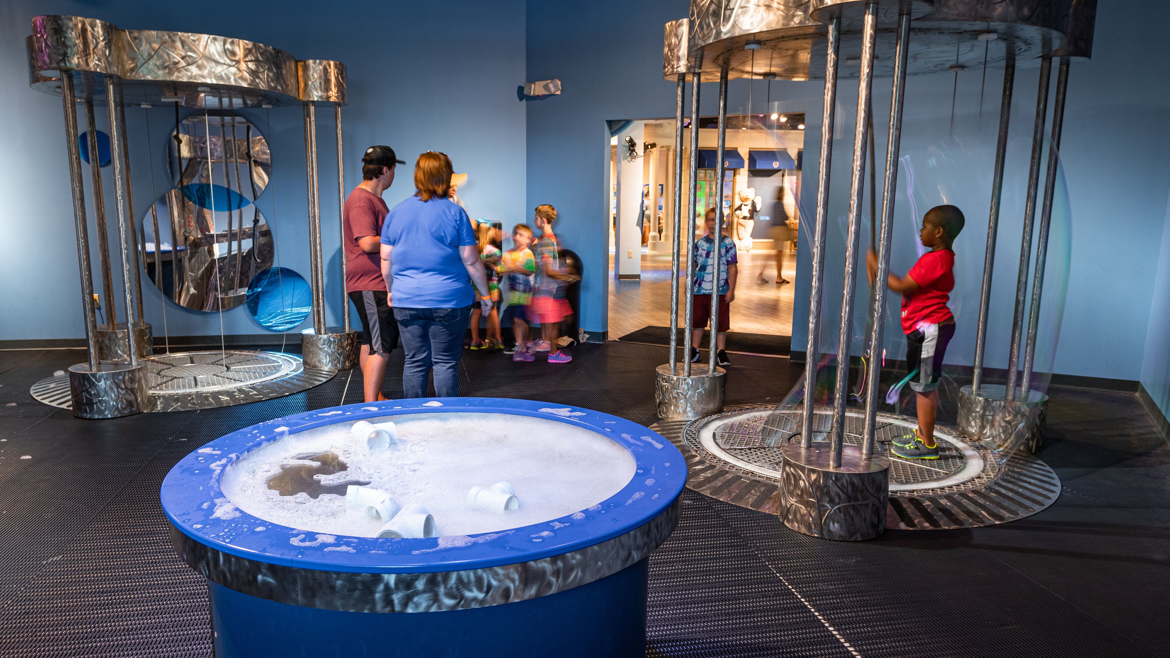 Children\'s Museum of Virginia featuring interior views as well as a family