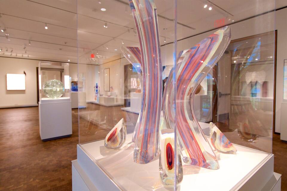 An art gallery with modern sculptures and glass installations.