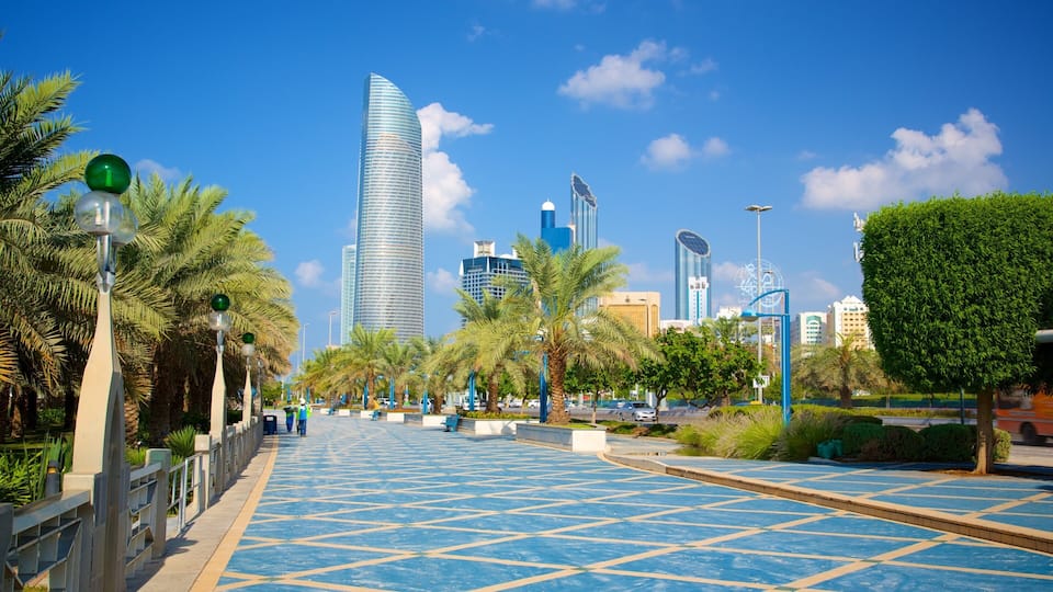 The Corniche which includes a square or plaza, a high rise building and modern architecture