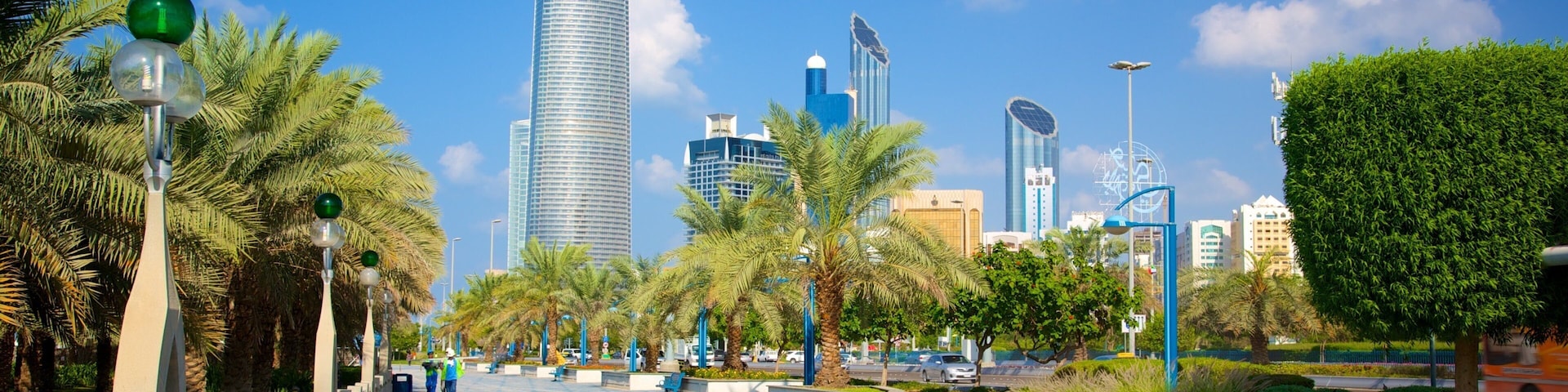 The Corniche which includes a square or plaza, a high rise building and modern architecture