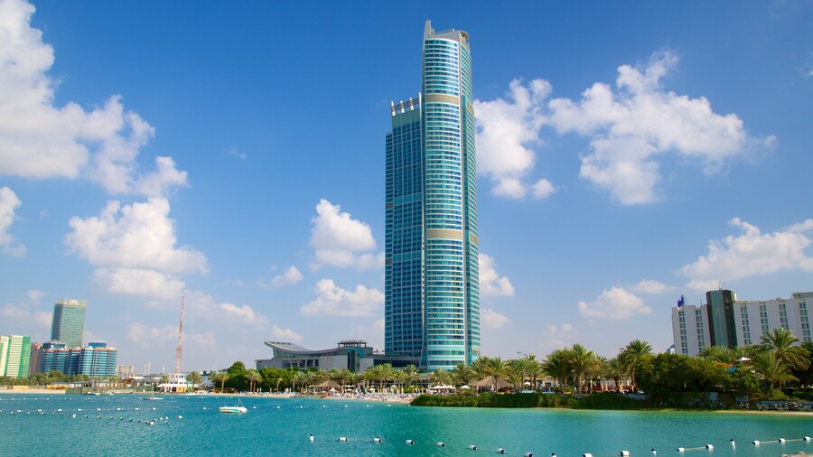 The Corniche featuring a high rise building, a bay or harbor and modern architecture