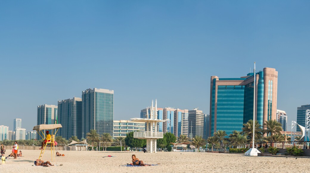Abu Dhabi city view at sunset from Corniche Beach, UAE
