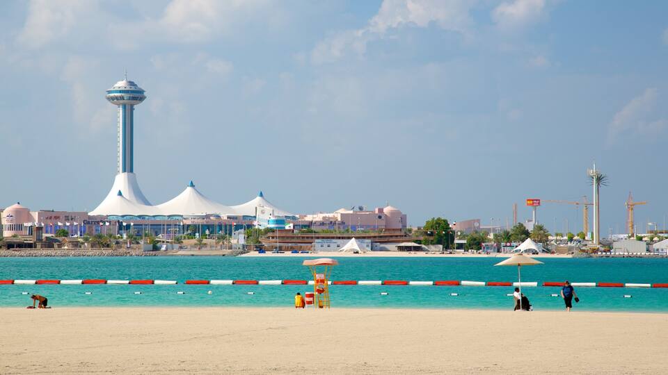 The Corniche featuring general coastal views, a beach and a coastal town