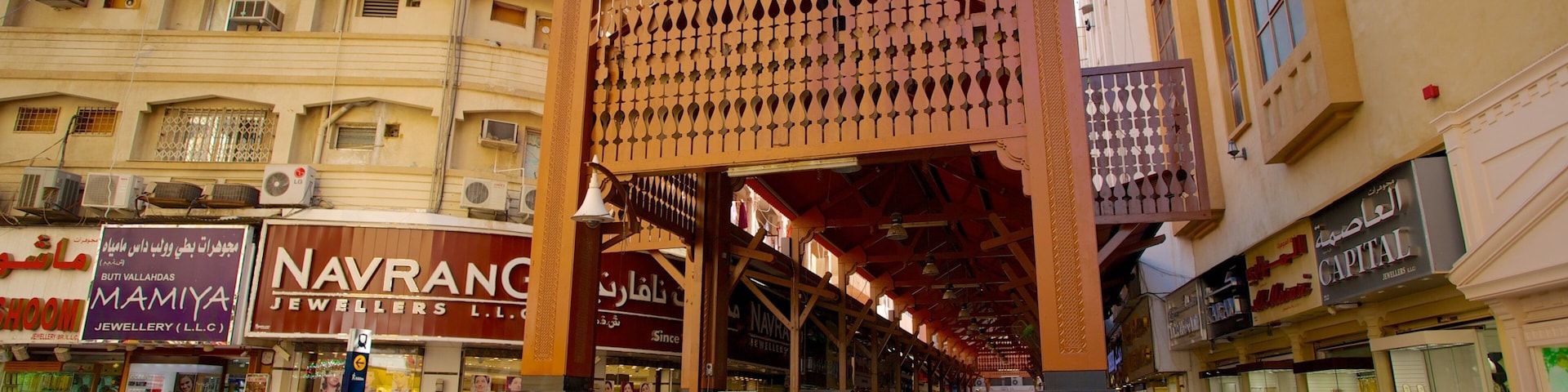 Souk Gold que incluye señalización, una ciudad y distrito central de negocios