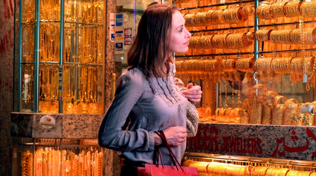 Gold Souk which includes interior views, shopping and markets