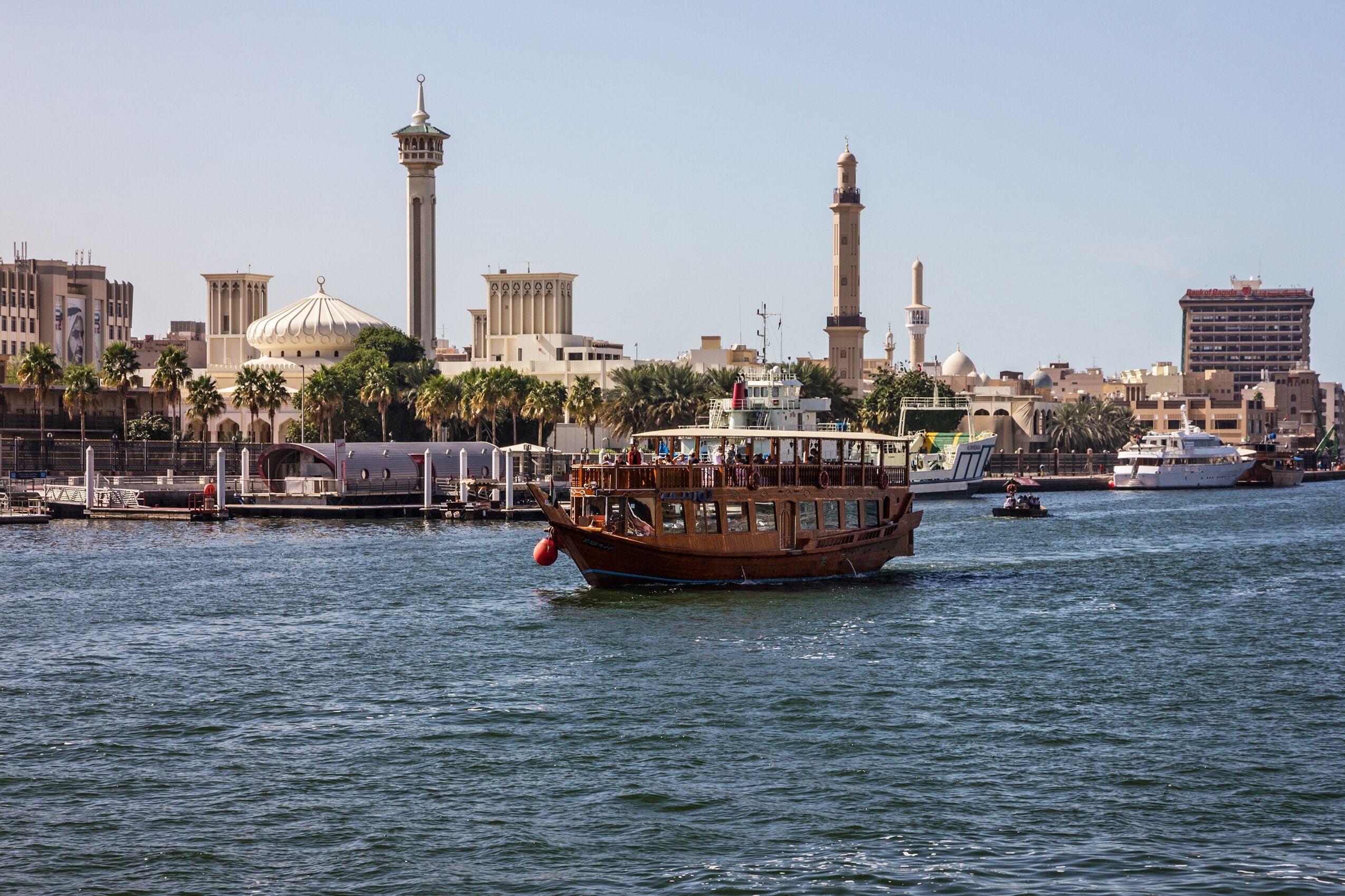 Dubai, UAE: Tourist boat abra on canal of Dubai Creek old tow