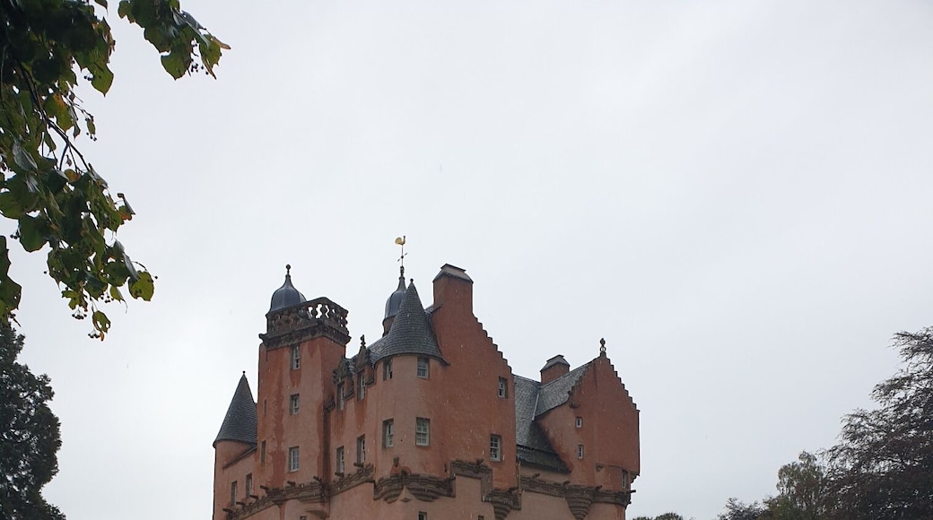 The castle with the first of the golden autumn leaves on the ground