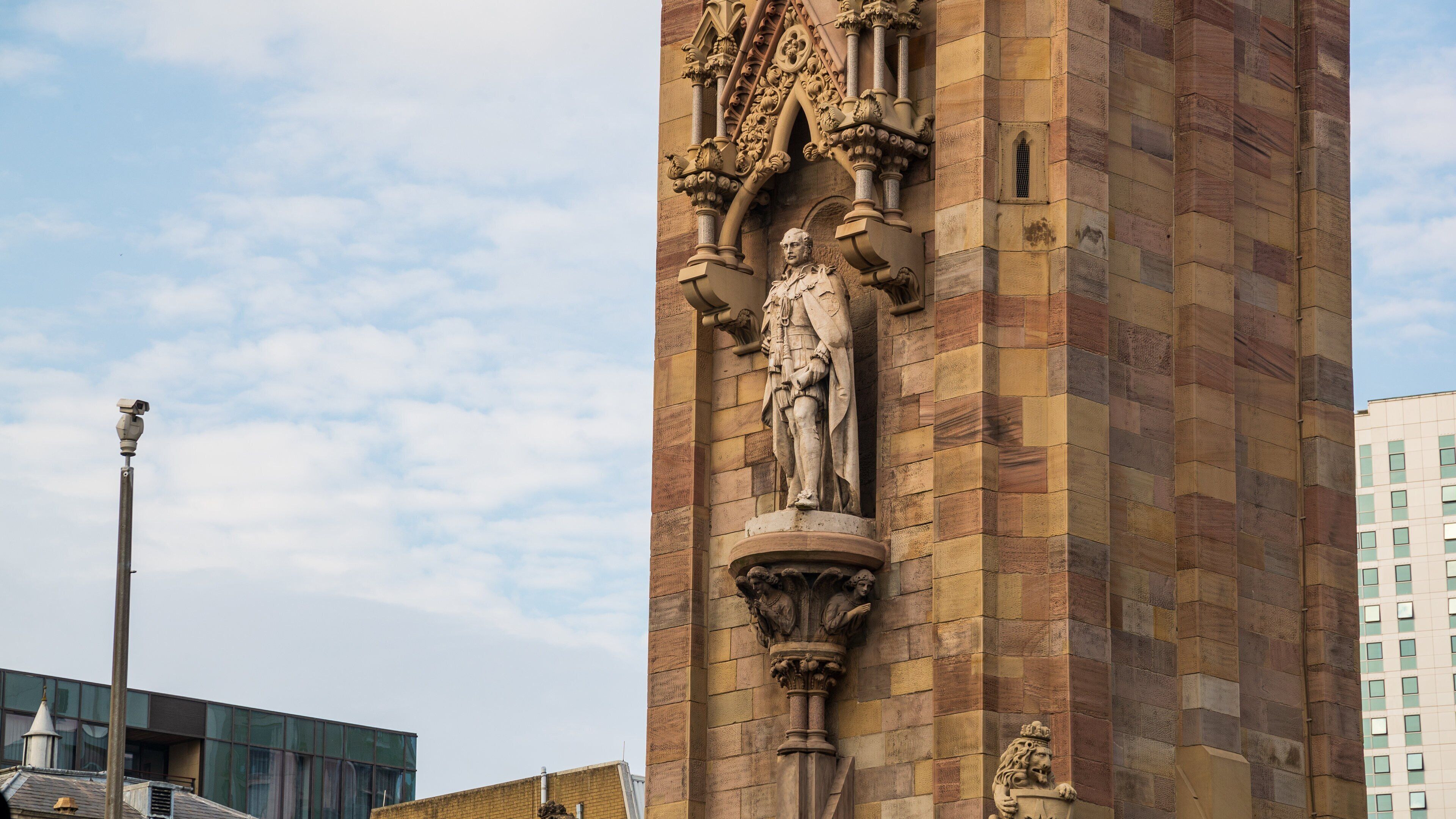 Albert Memorial Clock Tower featuring heritage elements and a statue or sculpture