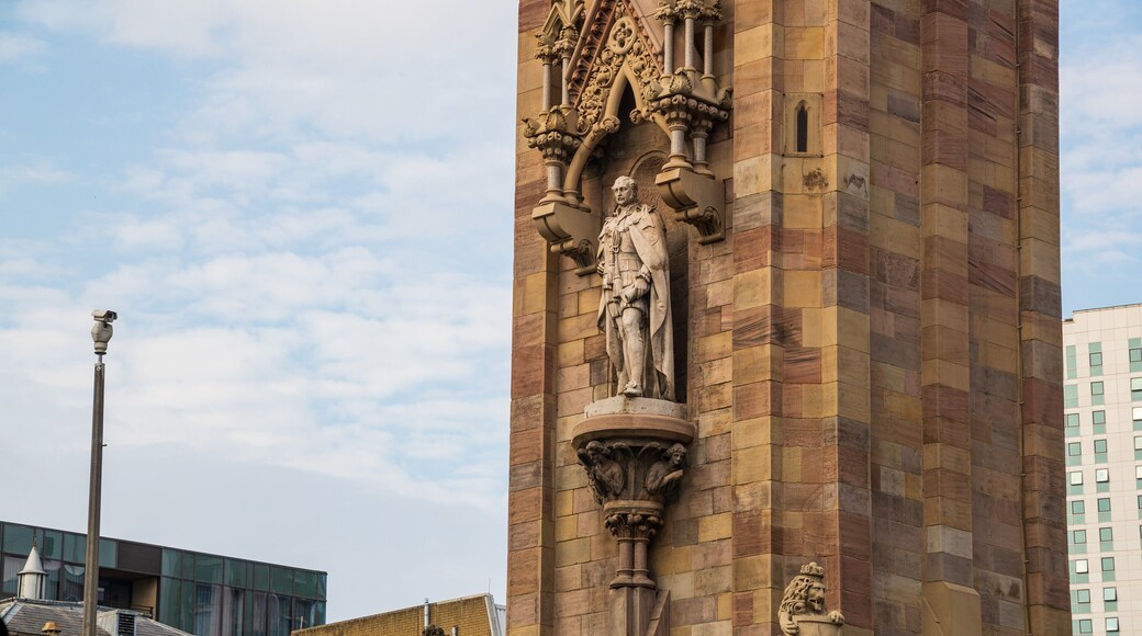Albert Memorial Clock Tower featuring heritage elements and a statue or sculpture
