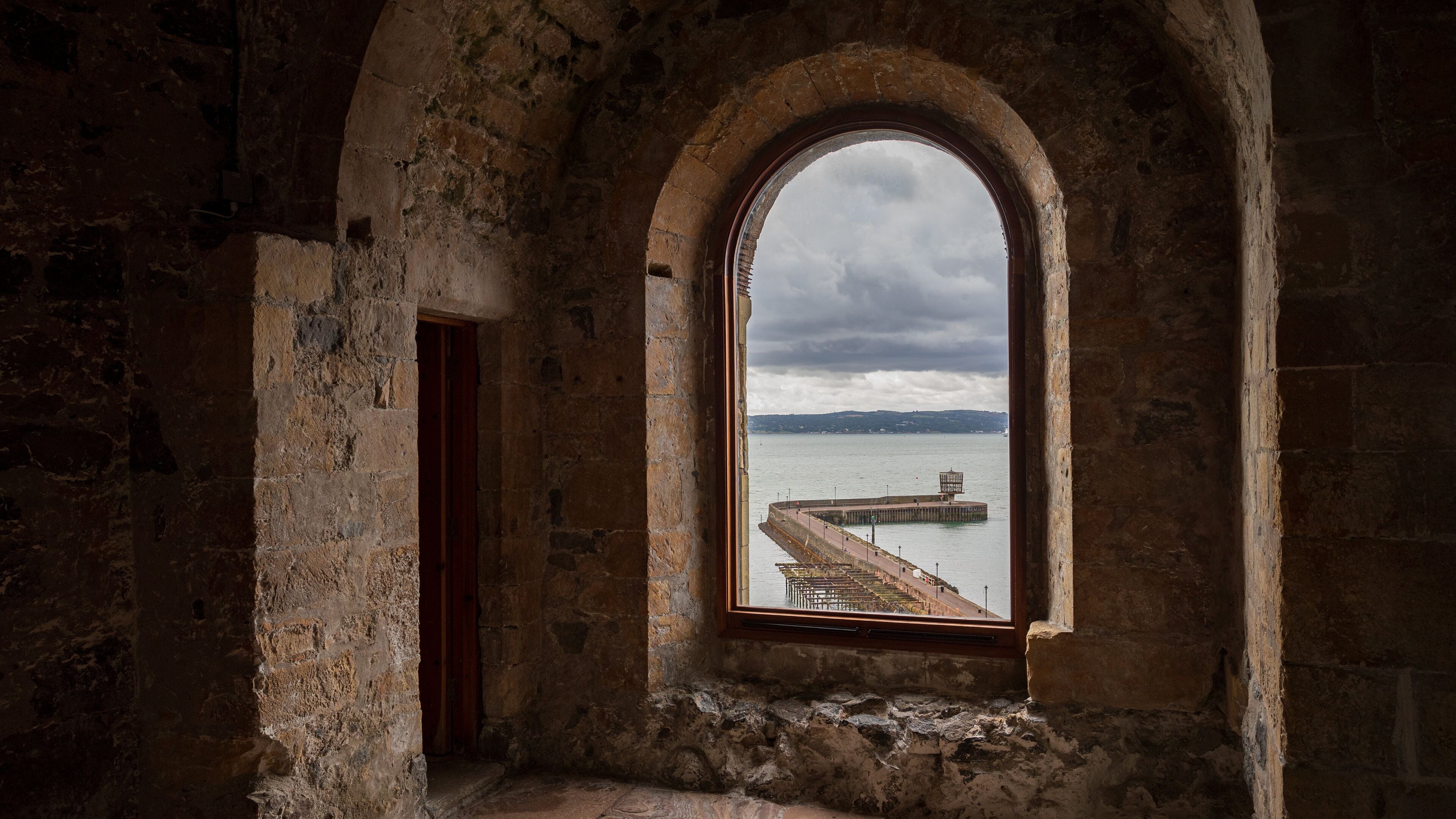 Carrickfergus Castle featuring interior views, heritage elements and a castle