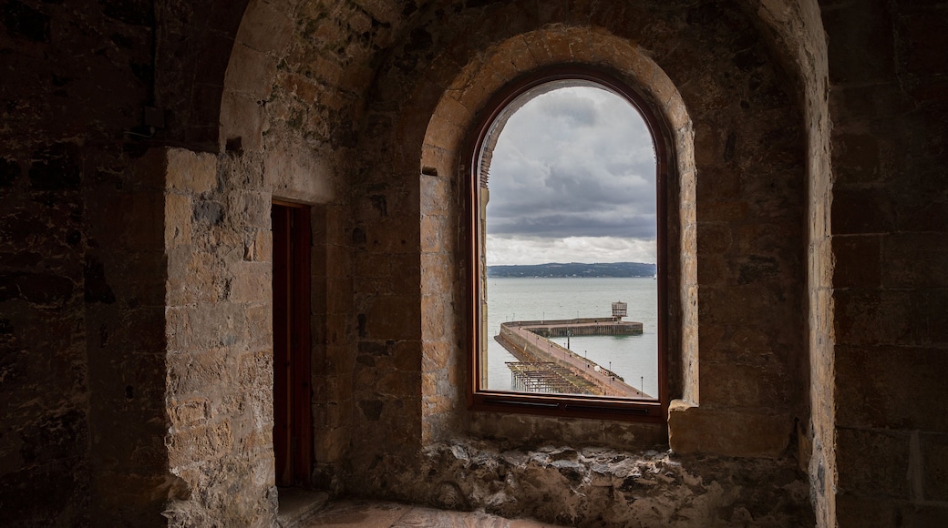 Carrickfergus Castle featuring interior views, heritage elements and a castle