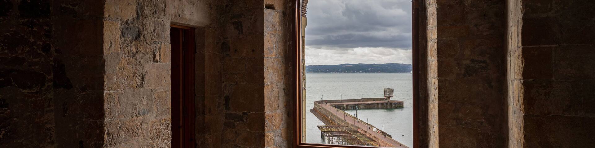 Carrickfergus Castle featuring interior views, heritage elements and a castle