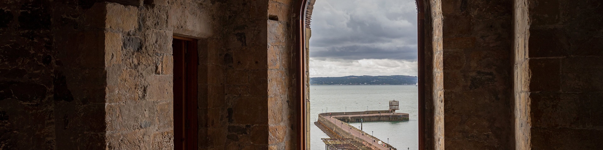 Carrickfergus Castle featuring interior views, heritage elements and a castle