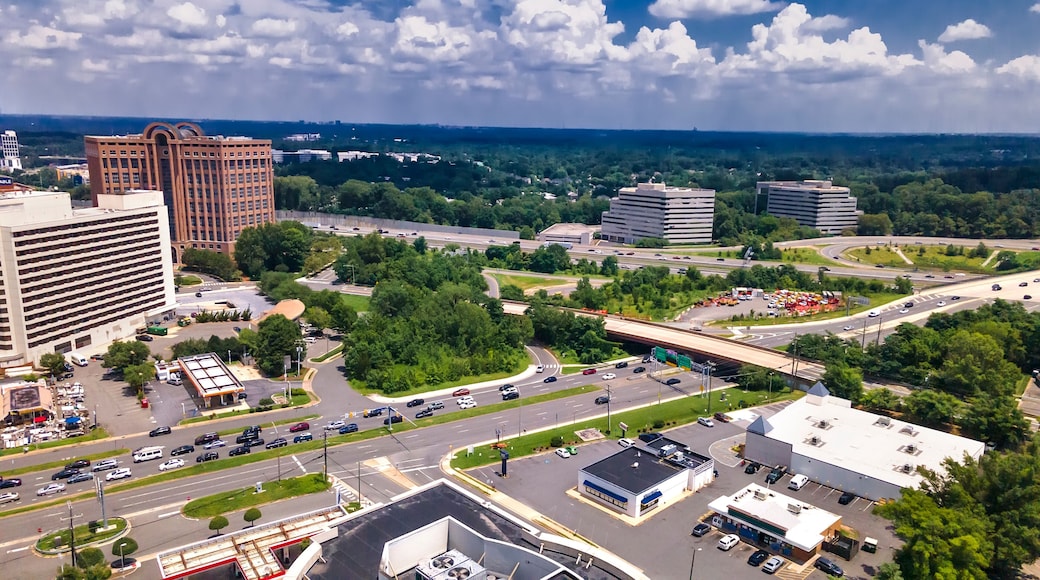 Downtown Tysons VA Business District from Above. Office towers, retail centers, and major roads intersecting.