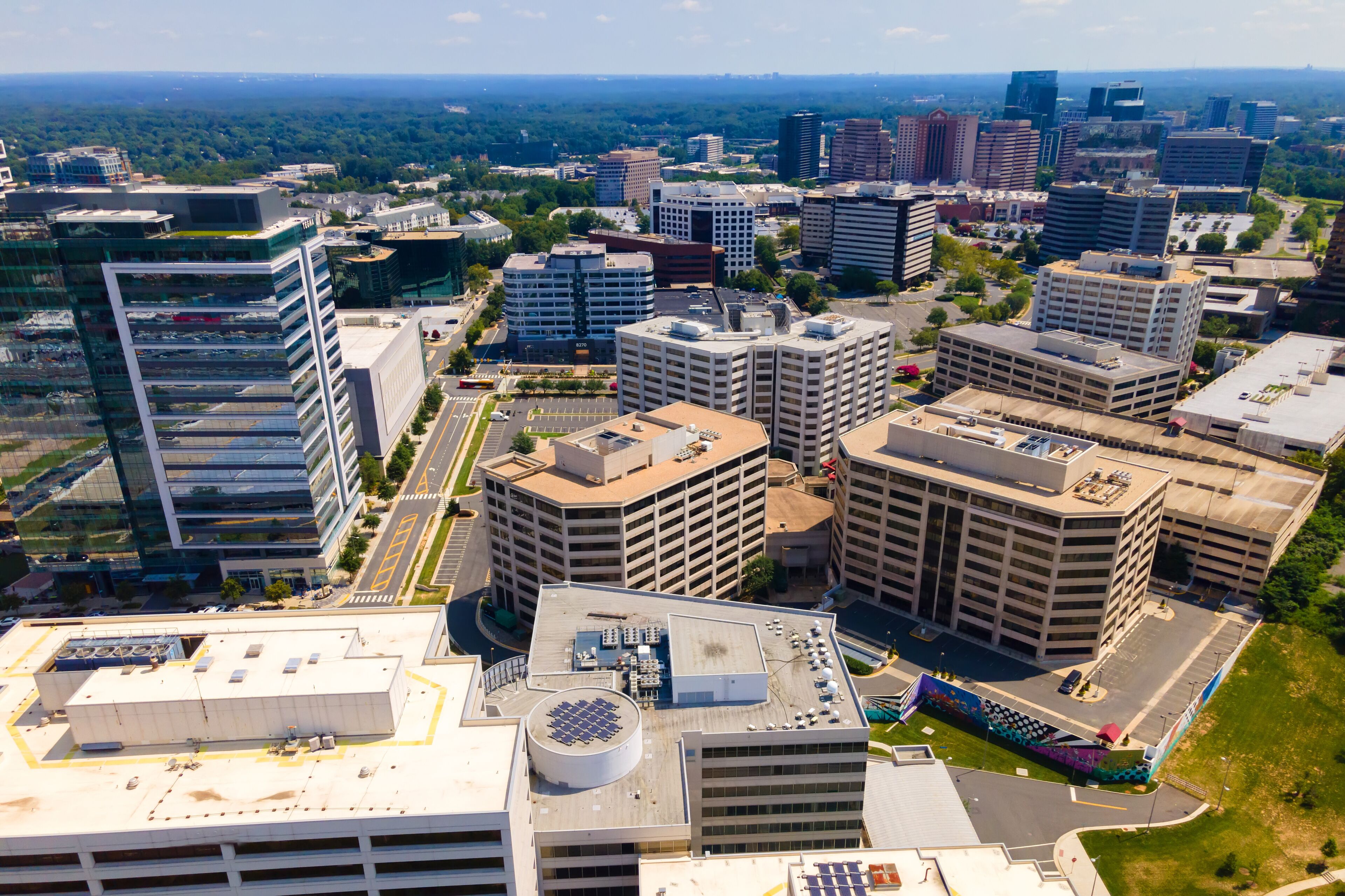 Modern buildings in Downtown Tysons, Virginia. Offices and skyscrapers. Drone video.