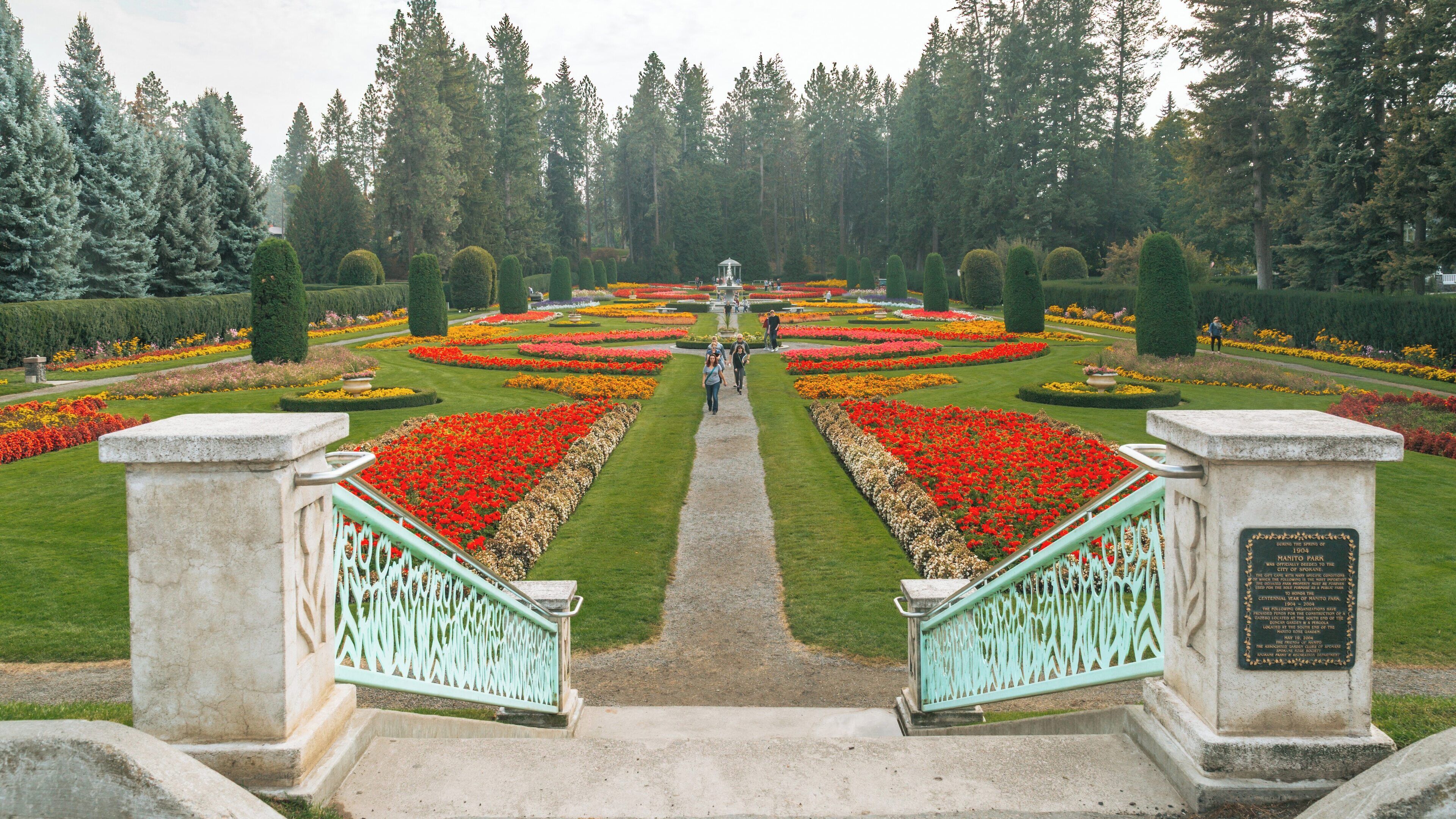 Vibrant floral displays create a stunning landscape at Manito Park in Spokane, Washington, showcasing the beauty of nature during the spring season