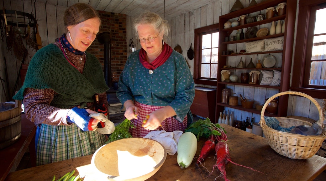 Fort Nisqually Living History Museum which includes interior views as well as a small group of people