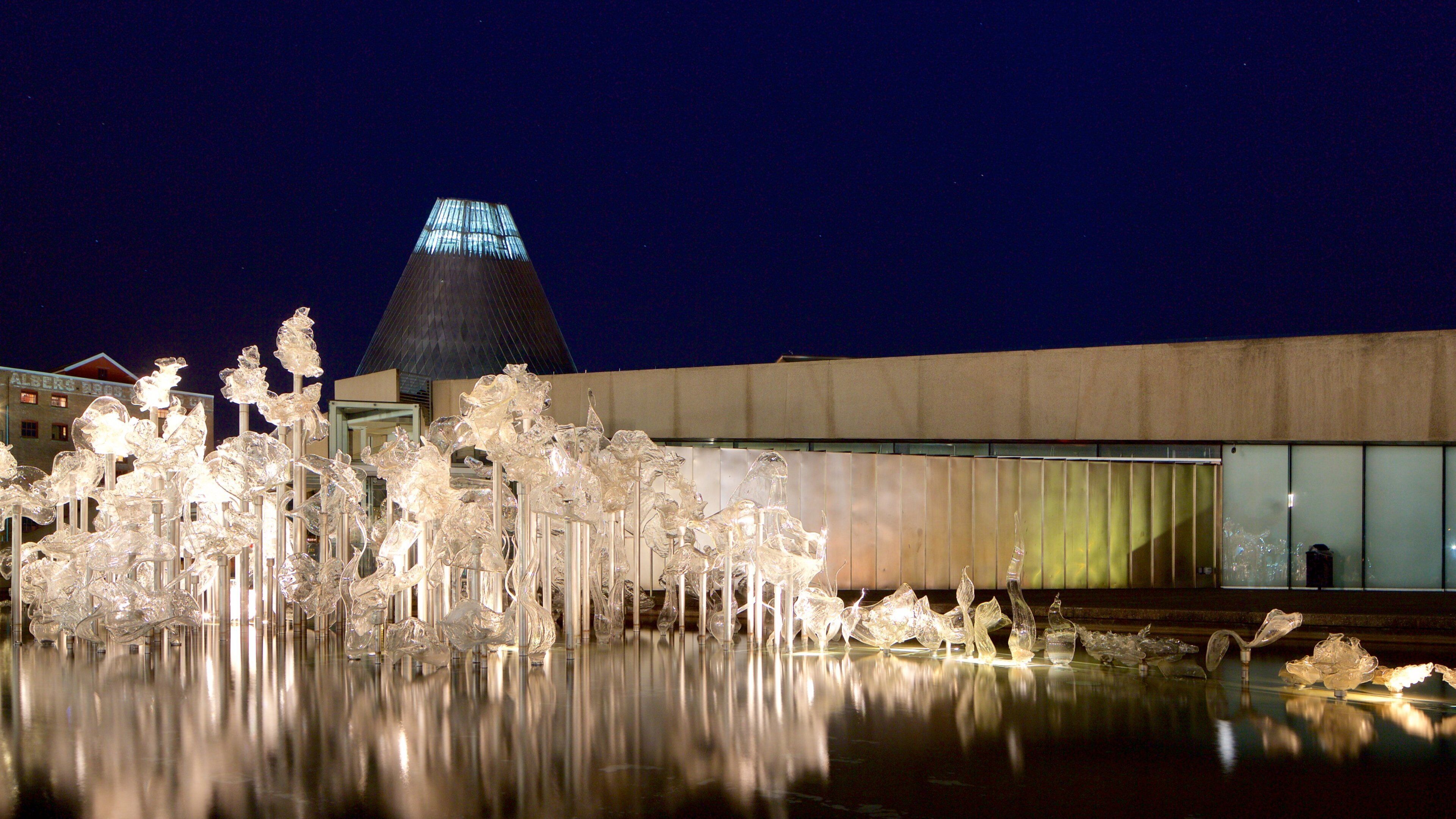 Museum of Glass which includes art, night scenes and modern architecture