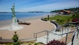 Alki Beach which includes landscape views, a square or plaza and a monument