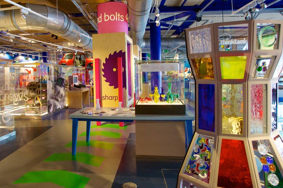 A modern interior with colorful displays and a prominent 'bolts' sign.