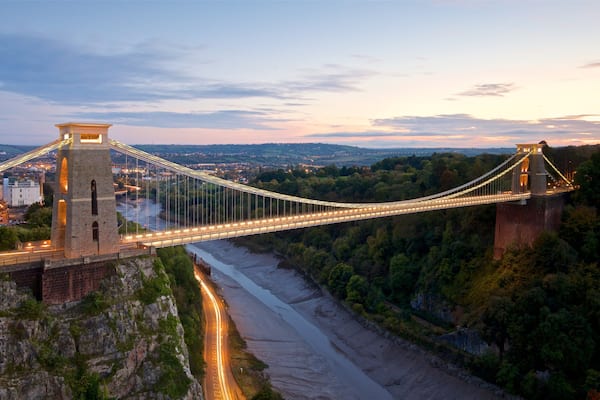 Clifton Suspension Bridge showing a sunset, a bridge and a river or creek