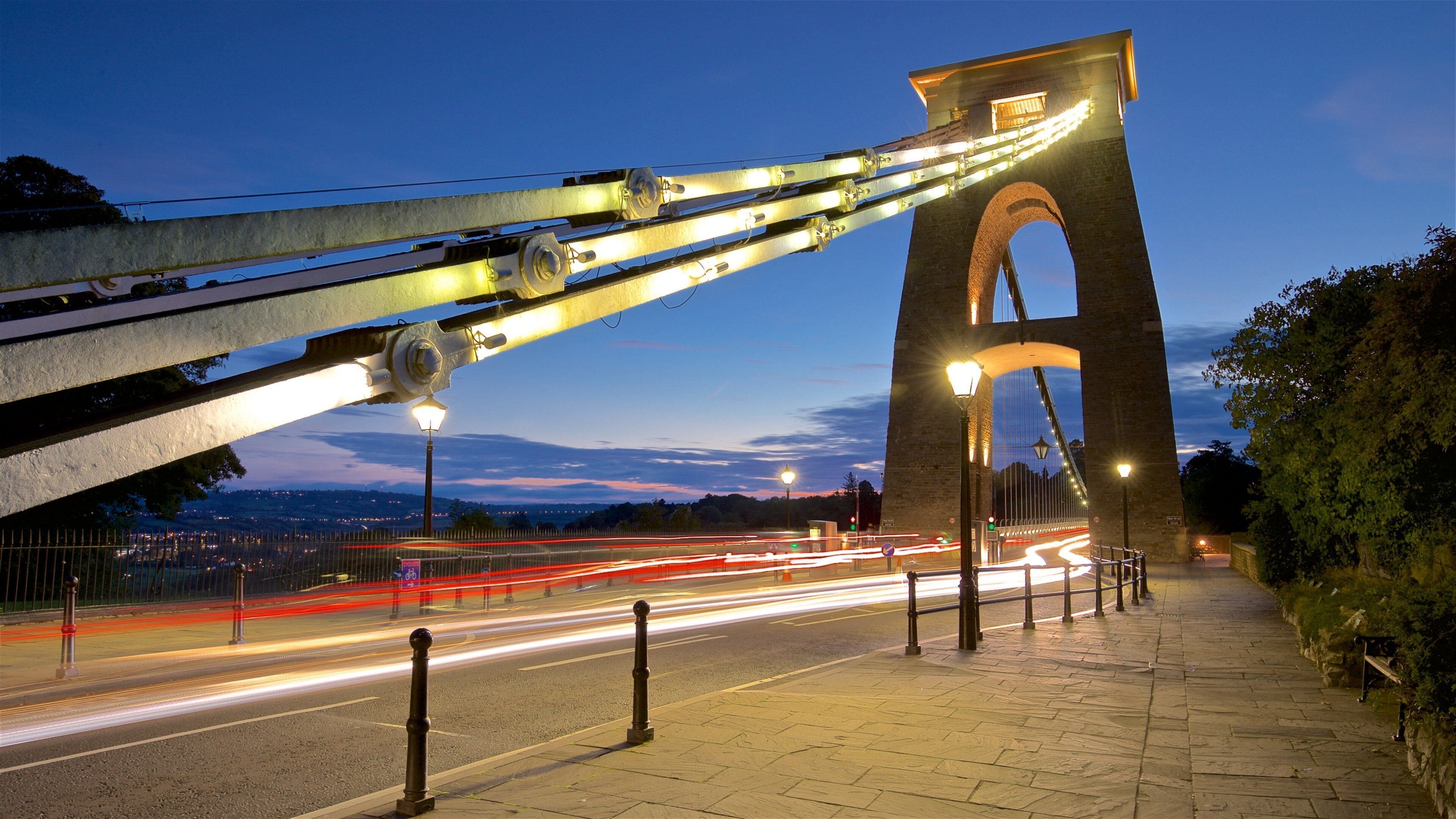 Clifton Suspension Bridge which includes night scenes, a bridge and a sunset