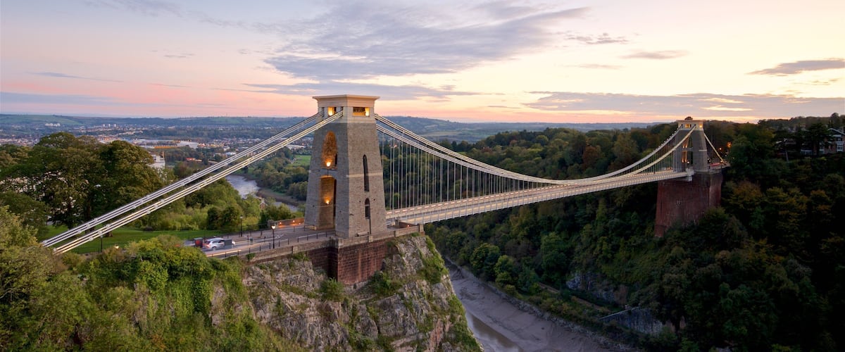 Clifton Suspension Bridge som viser solnedgang, landskap og bro
