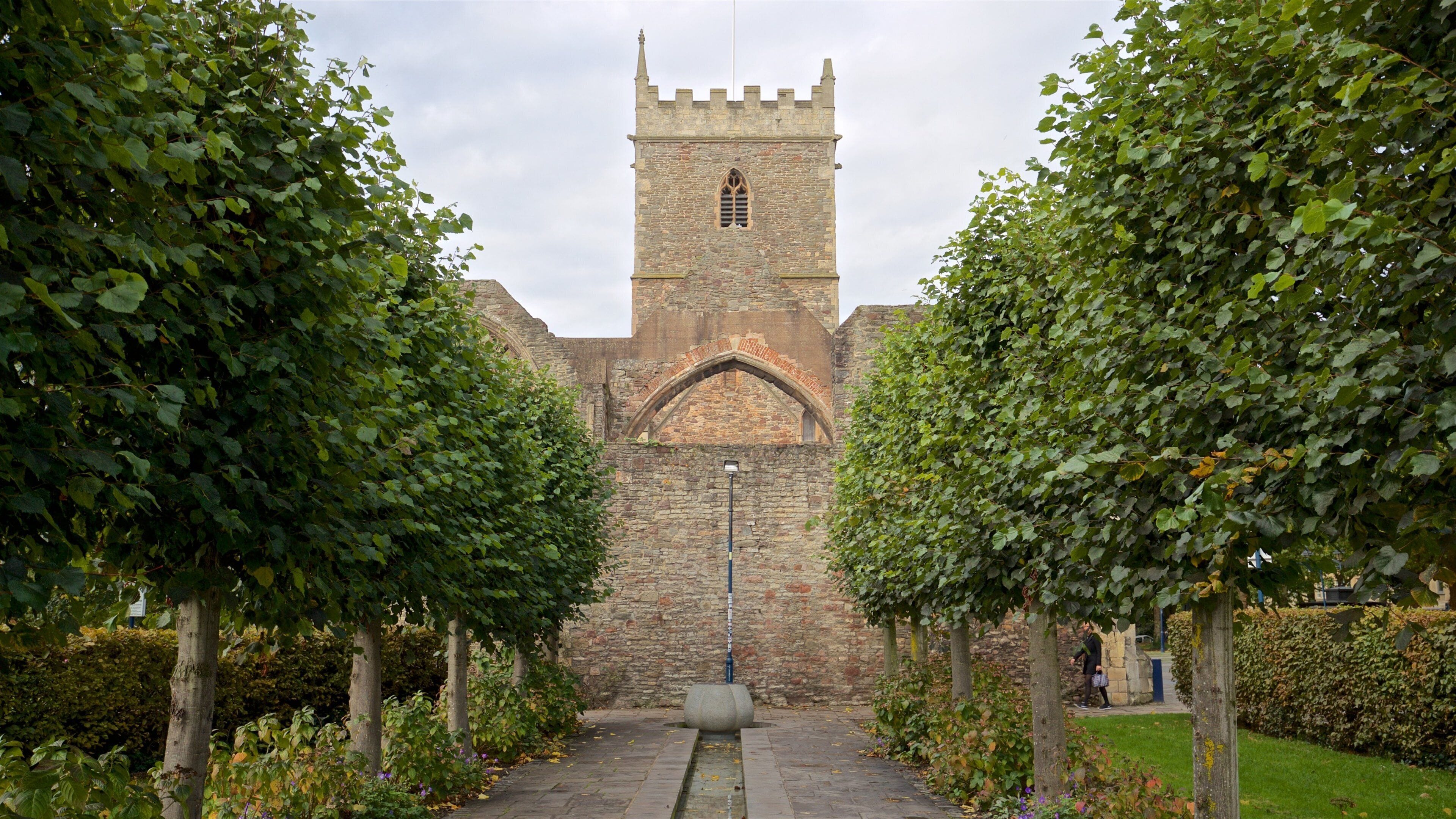 St. Peters Church which includes a garden, heritage architecture and a castle
