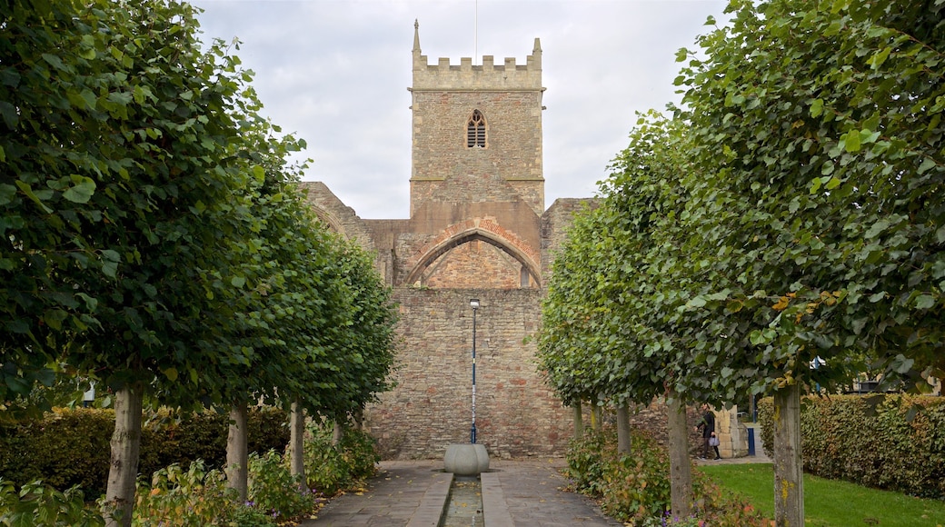 St. Peters Church which includes a garden, heritage architecture and a castle