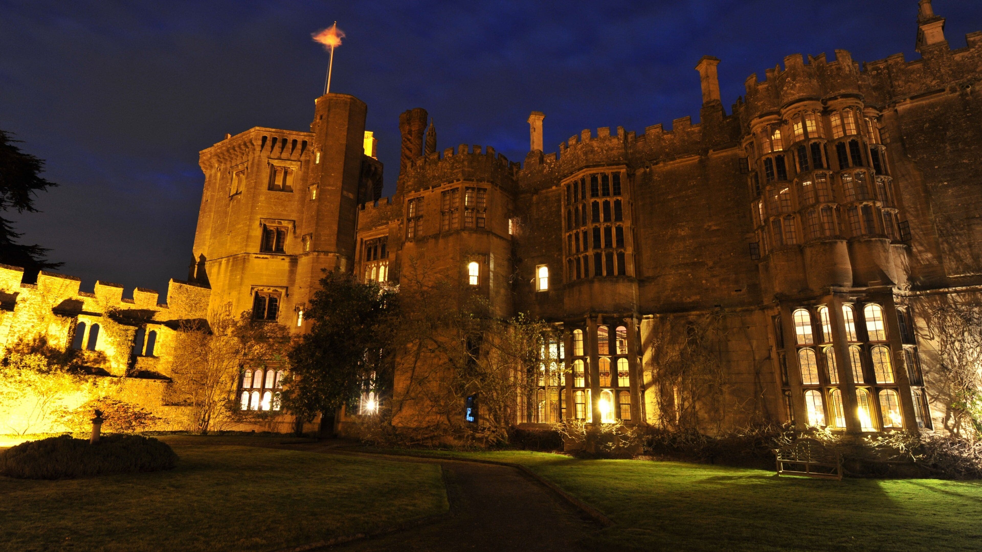 Thornbury Castle featuring heritage architecture, night scenes and chateau or palace