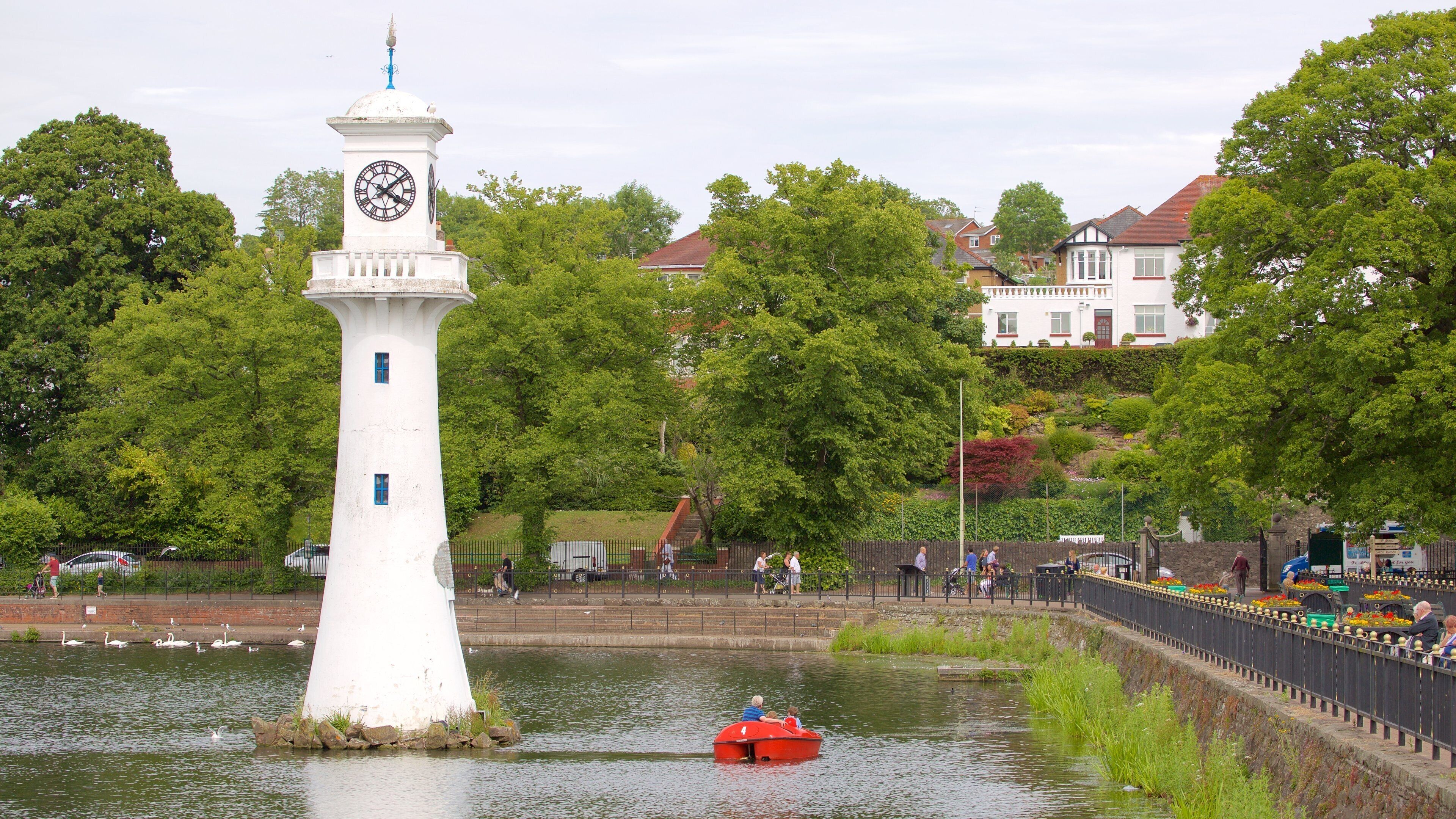 Roath Park showing watersports, a park and a lake or waterhole