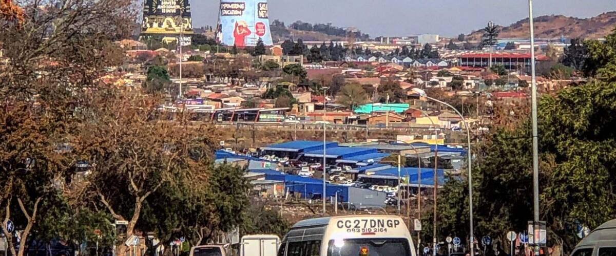 A view of the Soweto Towers from the Hector Pieterson Memorial. The towers were recently painted with advertisements, against many in the communityâs wishes.