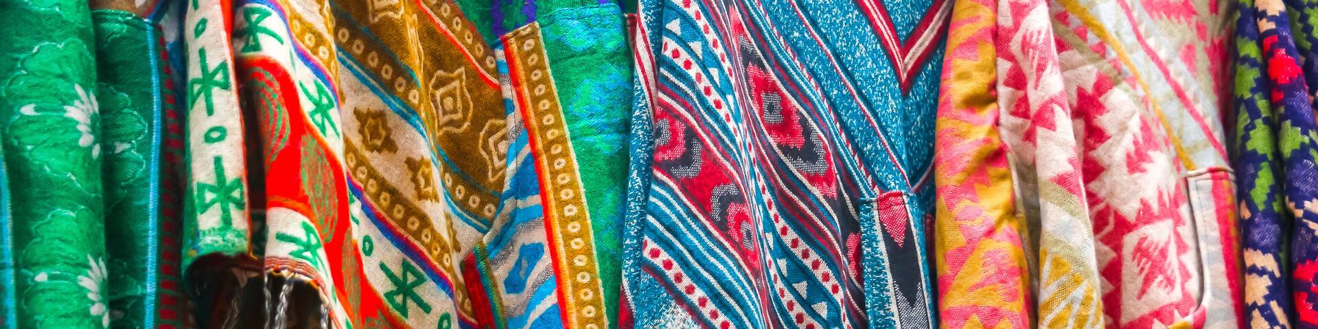 New Delhi, India. Beautiful scarves for sale at street gift store on the Main Bazaar (Paharganj).
