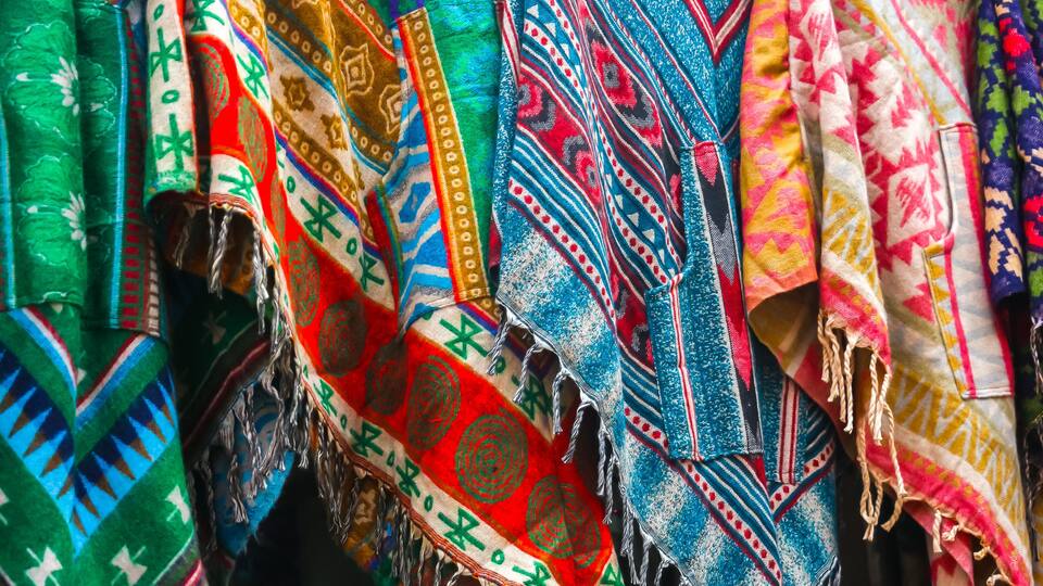 New Delhi, India. Beautiful scarves for sale at street gift store on the Main Bazaar (Paharganj).