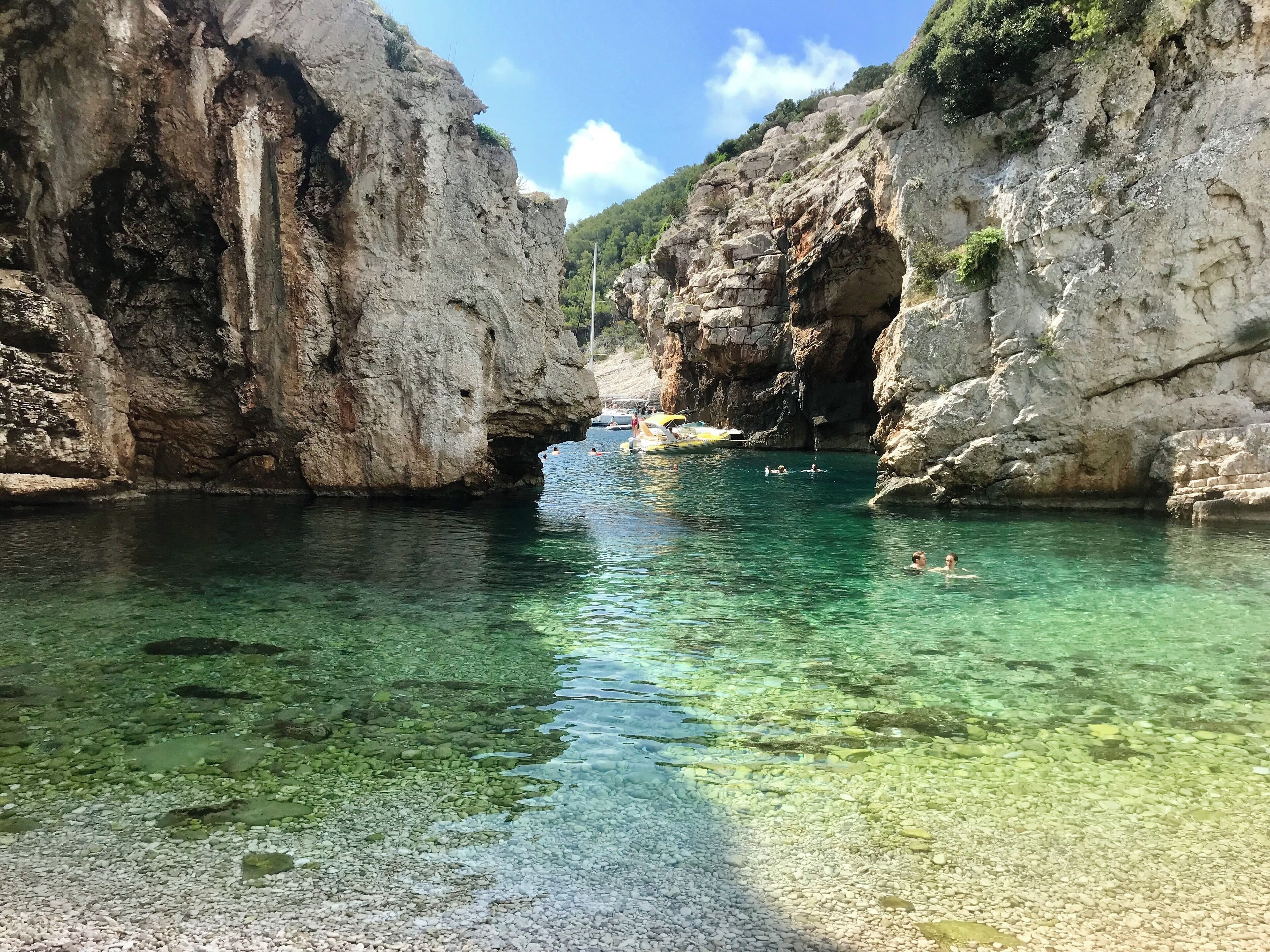 Typically the tour I took doesn’t stop here, but I requested it and thankfully they obliged! So so so pretty!! You swim in, it’s rocky, and you share it with a bunch of other people - still - would come back here in a heartbeat.