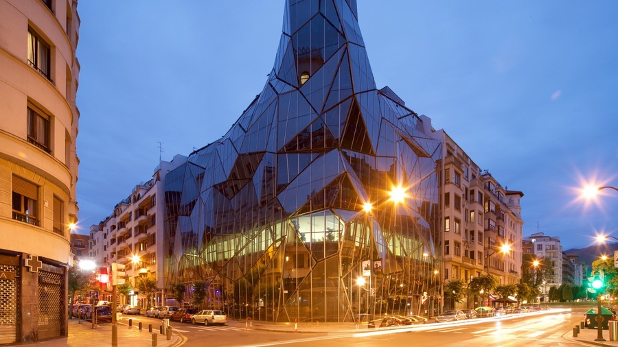 Bilbao showing a city, night scenes and modern architecture