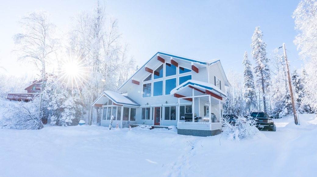 Our lake front cabin located by Big Lake in Wasilla, Alaska. The frozen lake and everything else around was covered in a white winter wonderland during the cold season. At nightfall, the temperature drops as low as 8 degree Fahrenheit. Chilly but beautiful. What a view waking up every morning.
