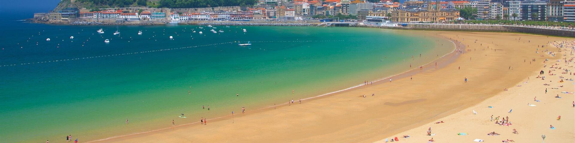 San Sebastian which includes general coastal views, a coastal town and a beach