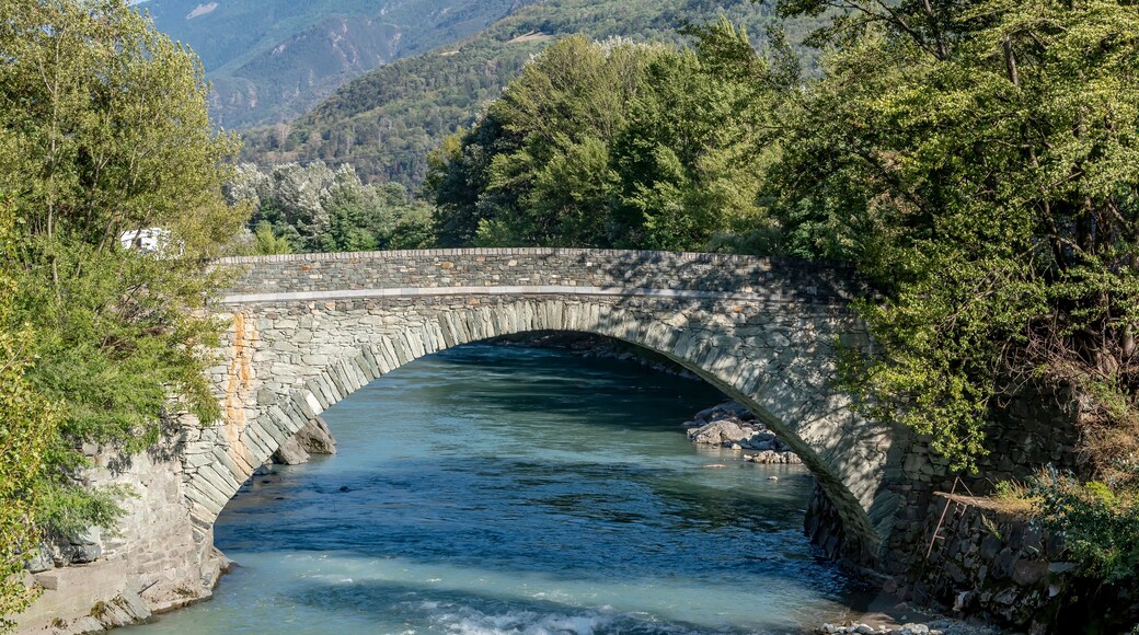 Stone bridge over the Dora Baltea river in Saint Marcel, Aosta Valley, Italy
