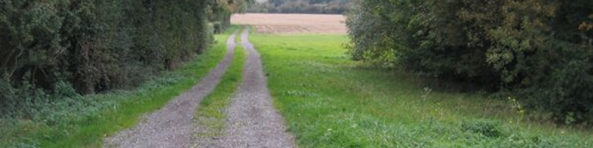 View from Campton Road, Meppershall, Beds. Â the end of Meppershall Airfield's grass runway is on the right.