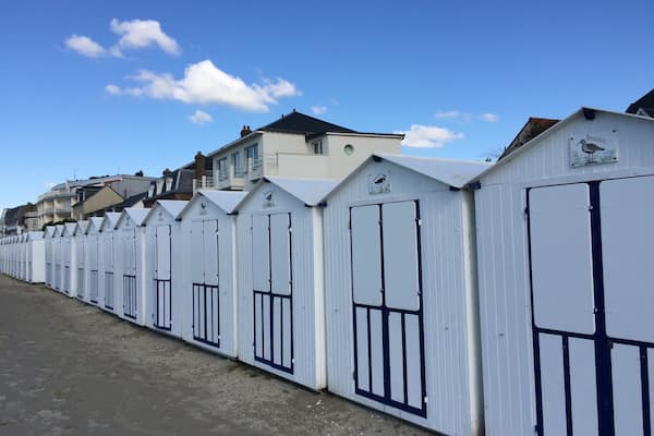 Beach huts along the beach promenade.