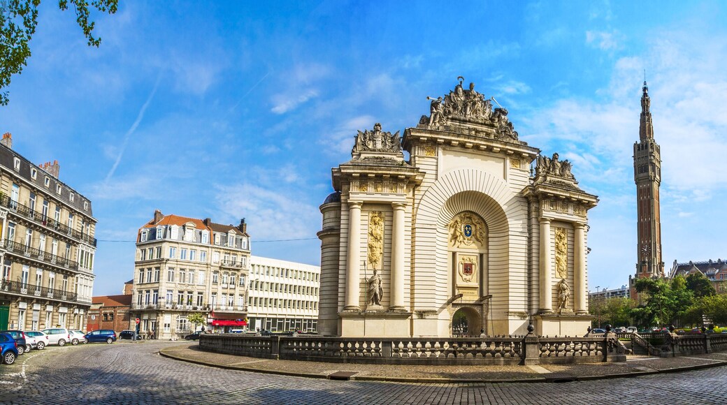 View of french city Lille with belfry, council hall and Paris’ gate