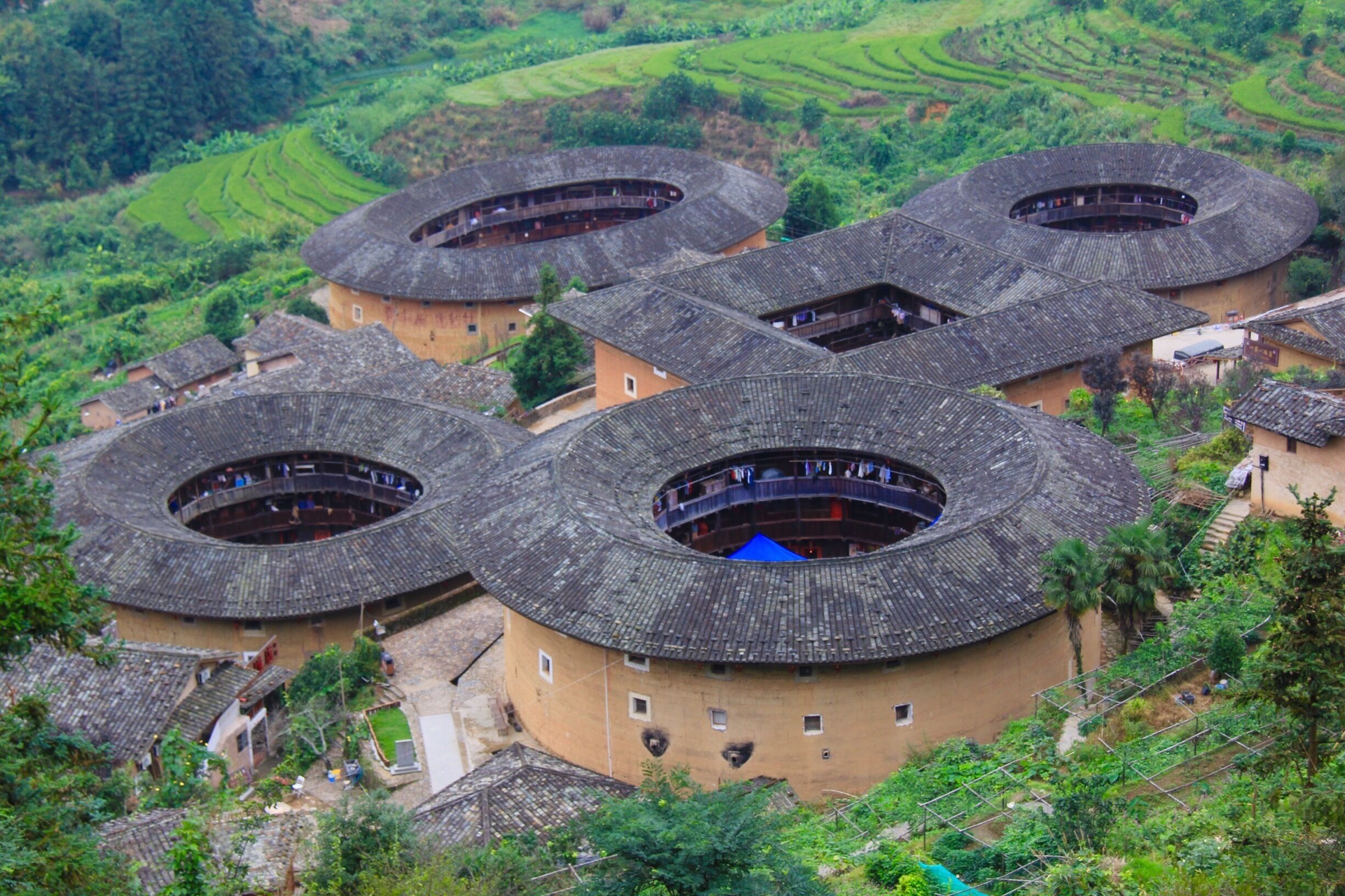A busy daily life at the circular Hakka Tulou, Nan Jing, China #China #Asia #travel #architecture #landscape #hiking #iconic #nationalpark
